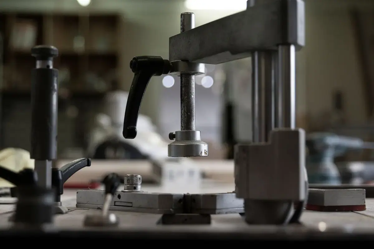Locksmith key machine and tools on the workbench